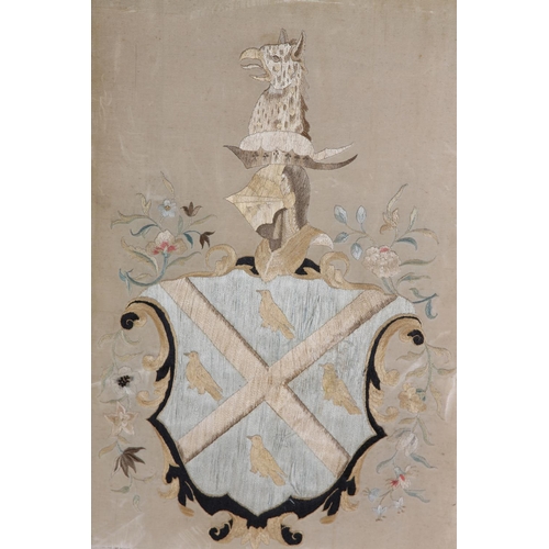 77 - AN EARLY 19TH CENTURY HERALDIC DESIGN in gros point on ivory silk, bearing arms of the Smyth family ... 