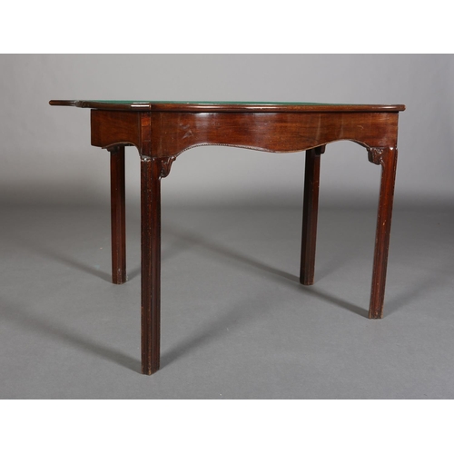 343 - AN 18TH CENTURY MAHOGANY CARD TABLE of serpentine outline, the fold-over top lined in baise, above a... 