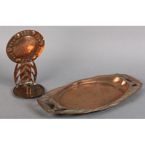 102 - AN ARTS & CRAFTS COPPER CANDLE WALL SCONCE, having a circular boss and pierced bracket with circular... 