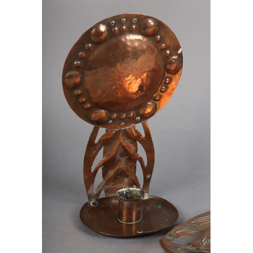 102 - AN ARTS & CRAFTS COPPER CANDLE WALL SCONCE, having a circular boss and pierced bracket with circular... 