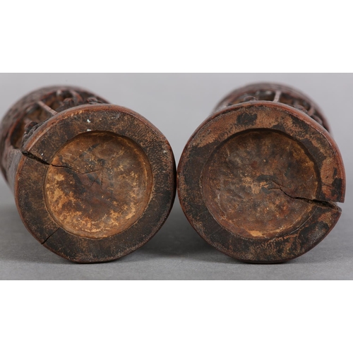 176 - A PAIR OF 19TH CENTURY BAMBOO BRUSH POTS, each carved in relief with figures amongst trees beneath a... 