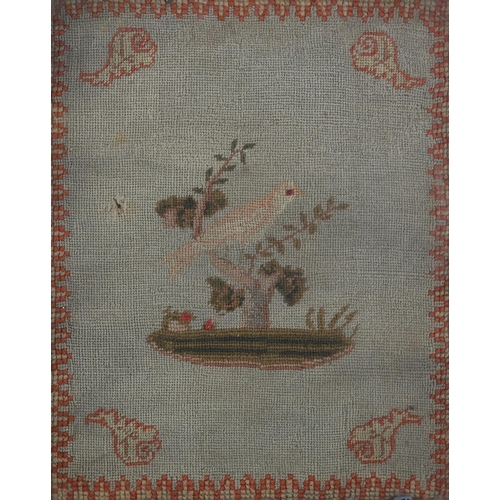 76 - A 19TH CENTURY NEEDLEWORK PANEL worked in pale blue/green, olive green, ivory and coral wool with a ... 