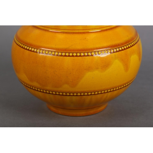 171 - A BURNMANTOFTS OCHRE GLAZE VASE, shape no. 692, the rounded body with beaded borders below a pierced... 