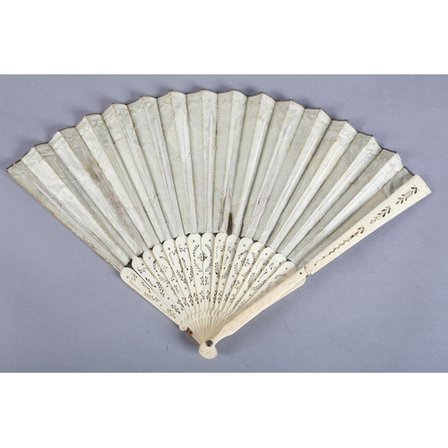 1 - Two late 18th century fans, the first with slender wood monture, the guards painted red and gilded, ... 