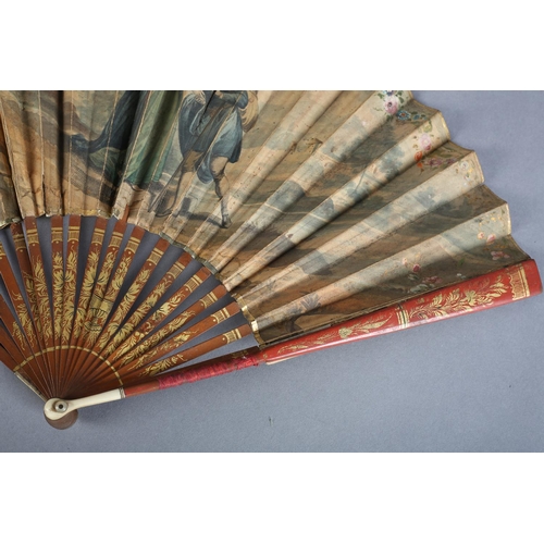 1 - Two late 18th century fans, the first with slender wood monture, the guards painted red and gilded, ... 