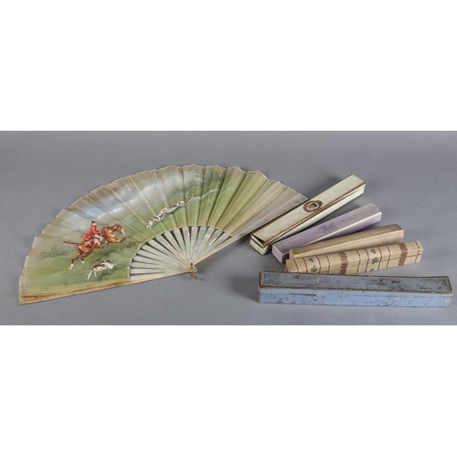 13 - A large late 19th century mother of pearl/burgau fan, boxed, the white gauze leaf painted with a hun... 