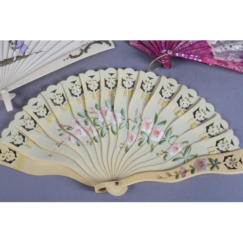 16 - A very feminine early 20th century gauze fan in fontange form, the mother of pearl monture dyed ceri... 