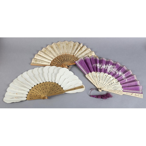 18 - Three 19th century fans, the first a Jenny Lind or Palmette example, the leaf panels mounted on carv... 