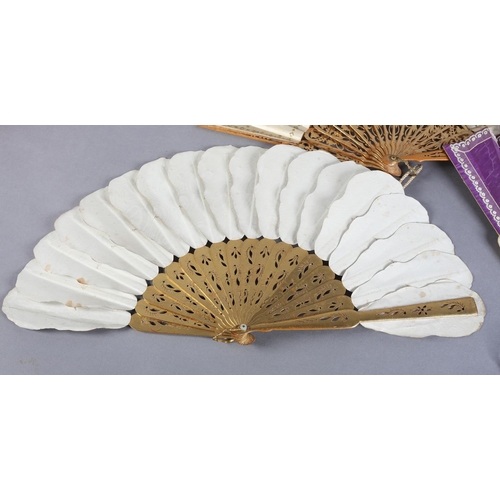 18 - Three 19th century fans, the first a Jenny Lind or Palmette example, the leaf panels mounted on carv... 