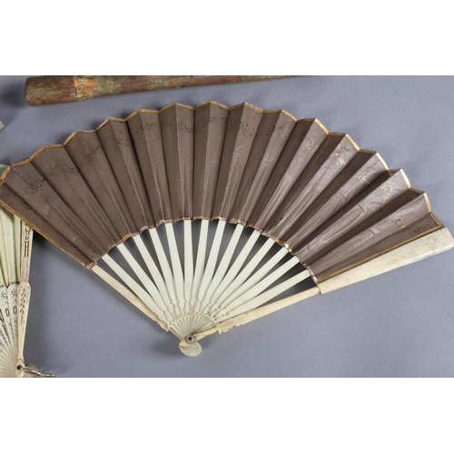 2 - The 18th century: a bone fan mounted with a coffee-coloured double paper leaf, the recto lightly gil... 