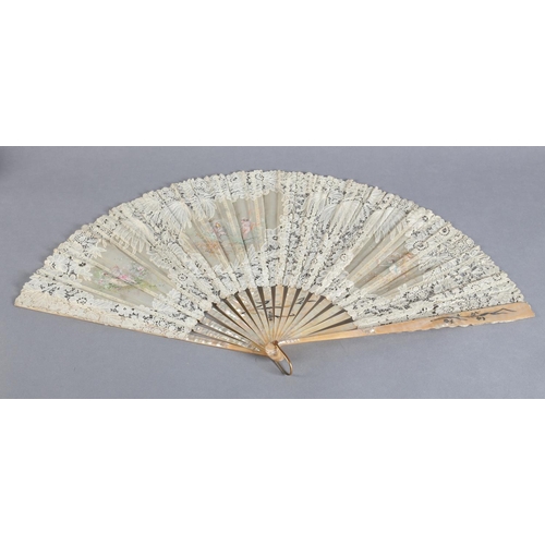 24 - Cherubs at Play: a large late 19th century Brussels bobbin lace fan, the leaf with a central gauze c... 