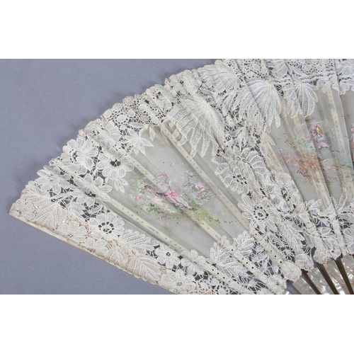 24 - Cherubs at Play: a large late 19th century Brussels bobbin lace fan, the leaf with a central gauze c... 