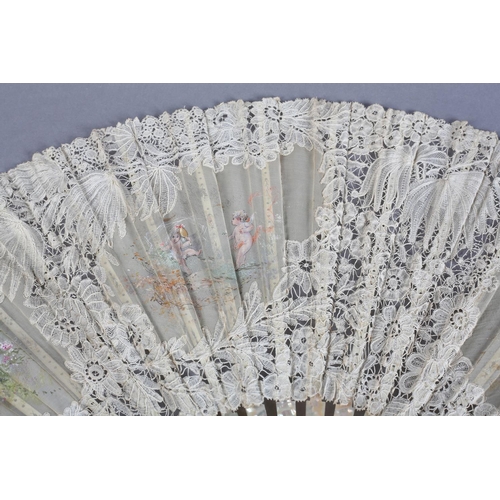 24 - Cherubs at Play: a large late 19th century Brussels bobbin lace fan, the leaf with a central gauze c... 