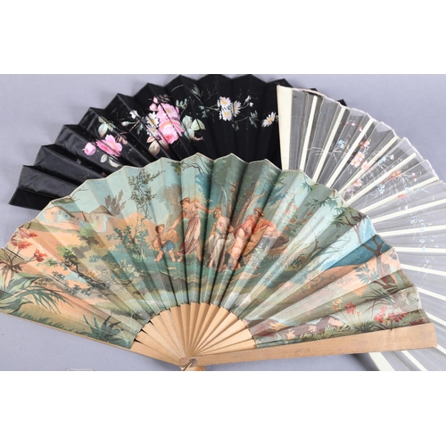 31 - Seven large late 19th century folding fans: an elegant wood fan, the monture gilded, the strong blac... 