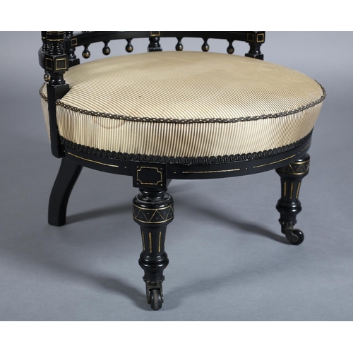 321 - A 19TH CENTURY AESTHETIC MOVEMENT EBONISED NURSING CHAIR with gilt detailing and button back silk up... 