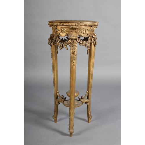 359 - A LATE 19TH CENTURY GILTWOOD AND GESSO URN STAND of serpentine tripod outline with gadroon rim, velv... 