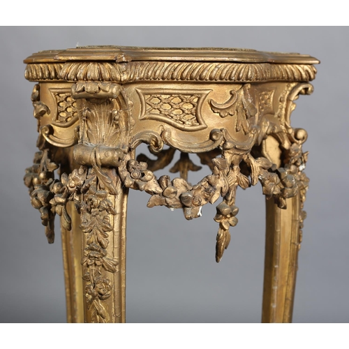 359 - A LATE 19TH CENTURY GILTWOOD AND GESSO URN STAND of serpentine tripod outline with gadroon rim, velv... 