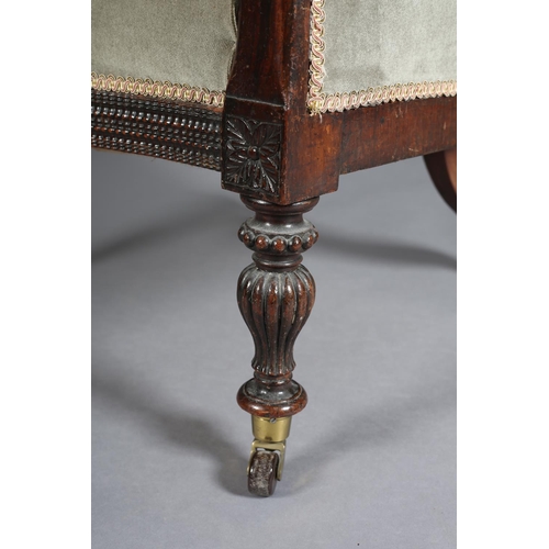 364 - A LATE WILLIAM IV ROSEWOOD ARMCHAIR having an encircling frame with opposing birds' head cresting, o... 