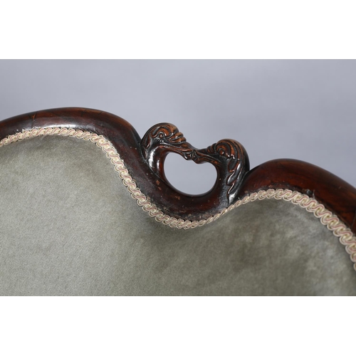 364 - A LATE WILLIAM IV ROSEWOOD ARMCHAIR having an encircling frame with opposing birds' head cresting, o... 