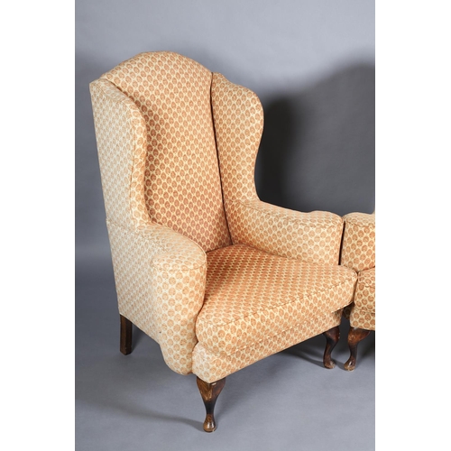 366 - A PAIR OF GEORGE III STYLE WINGED ARMCHAIRS having an arched back, outward scrolled arms and on shor... 