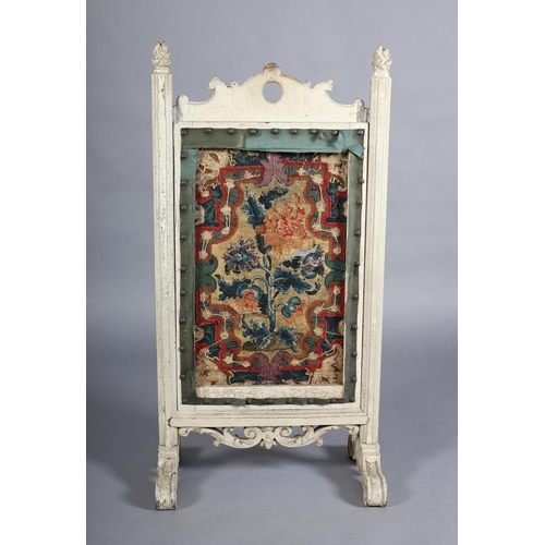 369 - A VICTORIAN CREAM PAINTED FIRE SCREEN with arched and pierced cresting carved with 'C' scrolls and l... 