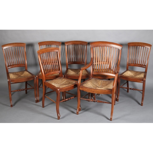 382 - A SET OF SEVEN LATE 19TH CENTURY WALNUT RAIL BACK DINING CHAIRS with rush seats, on stylised cabriol... 