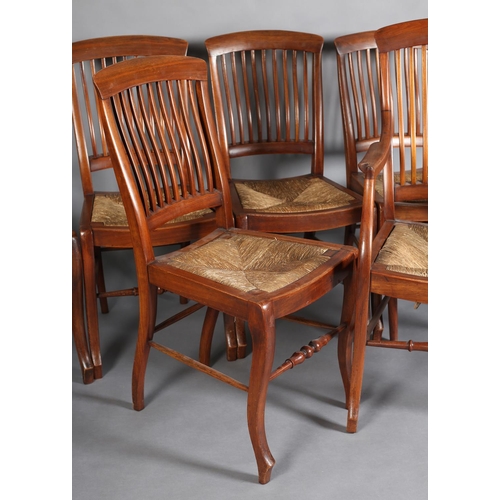 382 - A SET OF SEVEN LATE 19TH CENTURY WALNUT RAIL BACK DINING CHAIRS with rush seats, on stylised cabriol... 