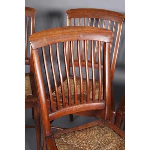 382 - A SET OF SEVEN LATE 19TH CENTURY WALNUT RAIL BACK DINING CHAIRS with rush seats, on stylised cabriol... 