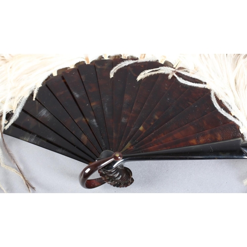 44 - A good, large female ostrich feather fan, the attractive feathers mounted on tortoiseshell, the head... 