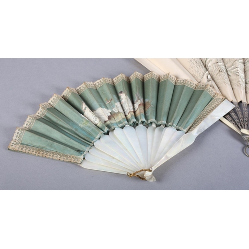 5 - A large c 1890’s folding fan, the monture a mix of bone to the guards and pierced metal to the gorge... 