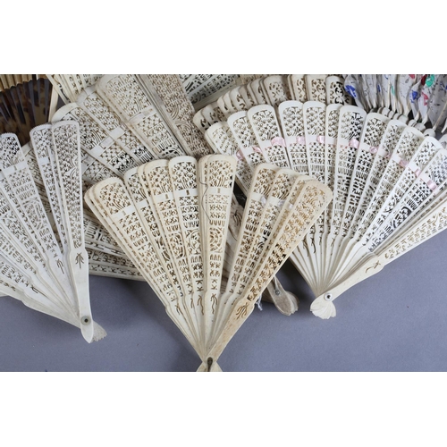 56 - A Chinese folding fan, the monture of bone and tortoiseshell, the paper leaf with gold background, t... 