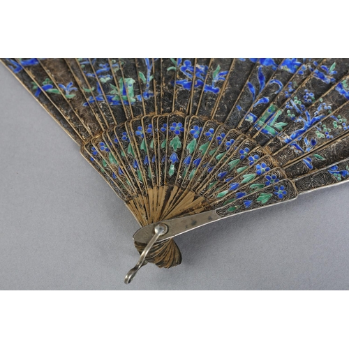 59 - A Canton Chinese filagree silver-gilt metal and enamel brisé fan, c 1830, the design of buildings fl... 