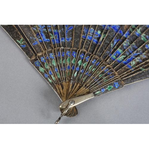 59 - A Canton Chinese filagree silver-gilt metal and enamel brisé fan, c 1830, the design of buildings fl... 