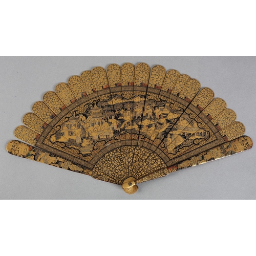 60 - A Chinese lacquer brisé fan, Qing dynasty, nineteen inner sticks and two guards, the black lacquer d... 