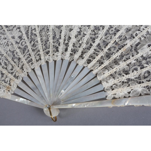 7 - Two white mother of pearl and Belgian lace fans, late 19th century, the first with Bobbin lace leaf,... 