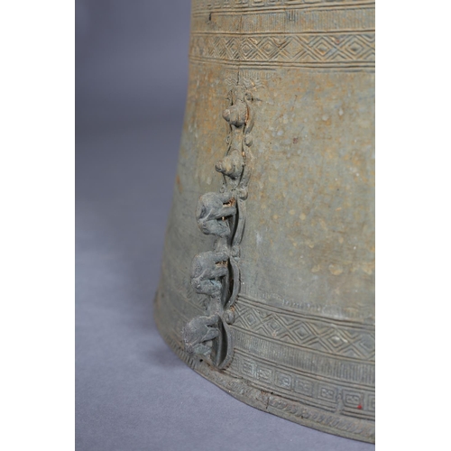 80 - A PAIR OF BURMESE BRONZE RAIN DRUMS, possibly 19th century of graduated size, finely cast, the patin... 