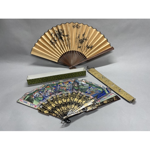 52 - A mid-19th century Chinese Mandarin fan, Qing Dynasty, the lacquered and delicately painted monture ... 