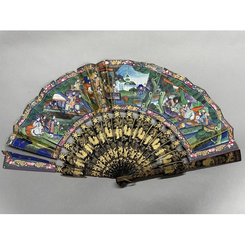 52 - A mid-19th century Chinese Mandarin fan, Qing Dynasty, the lacquered and delicately painted monture ... 