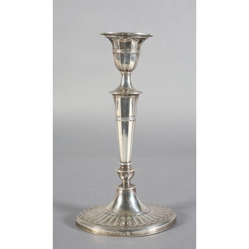 225B - AN EDWARD VII SILVER CANDLESTICK SHEFFIELD 1901, by Hawksworth, Eyre and Co Ltd, neo-classical desig... 