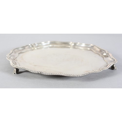 228B - A GEORGE V SILVER TRAY SHEFFIELD 1927 by Walker and Hall, of circular serpentine outline with gadroo... 