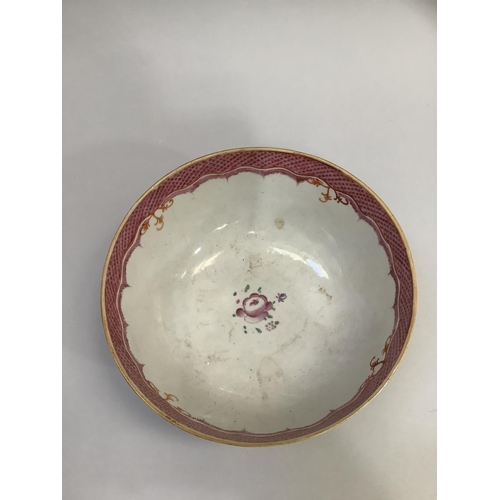 28 - A 19th century Chinese famille rose bowl, the exterior painted with sprays of flowers, a pink diaper... 