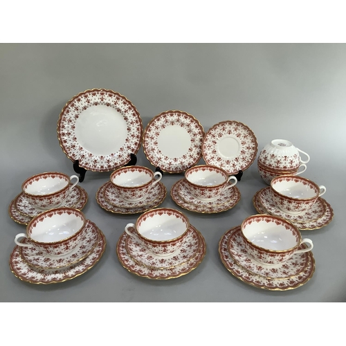 14 - A Spode bone china tea service of fleur-de-lys patter comprising nine cups, eight saucers, eight tea... 