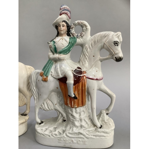 15 - Two Staffordshire equestrian figures, Scotsman titled 'Peace', the other a young girl holding a lamb... 