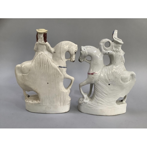 15 - Two Staffordshire equestrian figures, Scotsman titled 'Peace', the other a young girl holding a lamb... 