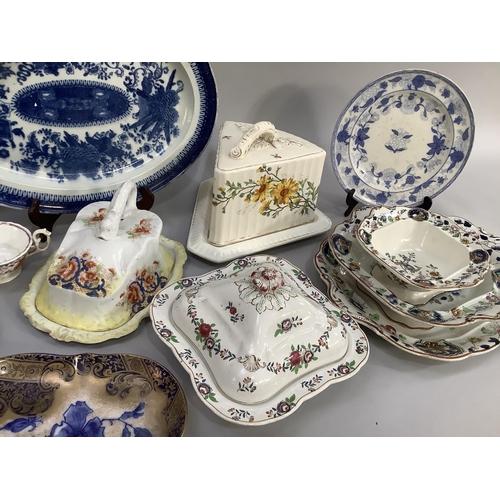 102 - Victorian and later table ware including a blue and white pearl ware meat dish  (chip to the edge), ... 