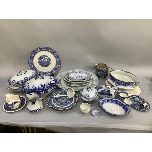 111 - An Asiatic blue and white printed meat dish, three serving bowls and one cover, other blue and white... 