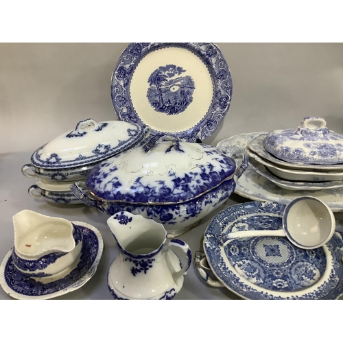 111 - An Asiatic blue and white printed meat dish, three serving bowls and one cover, other blue and white... 