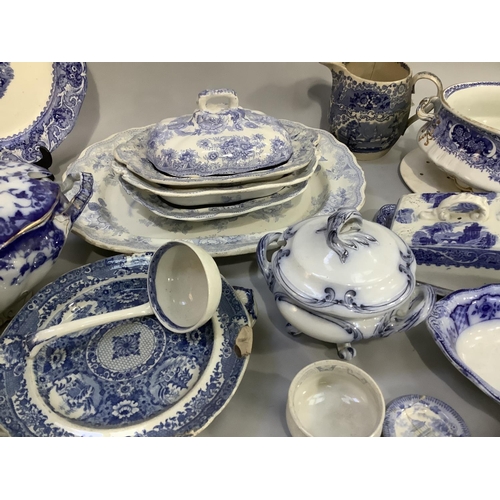 111 - An Asiatic blue and white printed meat dish, three serving bowls and one cover, other blue and white... 