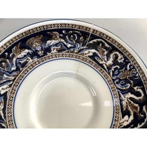 20 - A Wedgwood dark blue Florentine tea and dinner service comprising six cups and saucers, lidded sugar... 