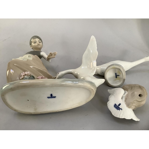 23 - A Lladro figure of a young girl carrying a basket of eggs chased by a goose, 21.5cm high together wi... 